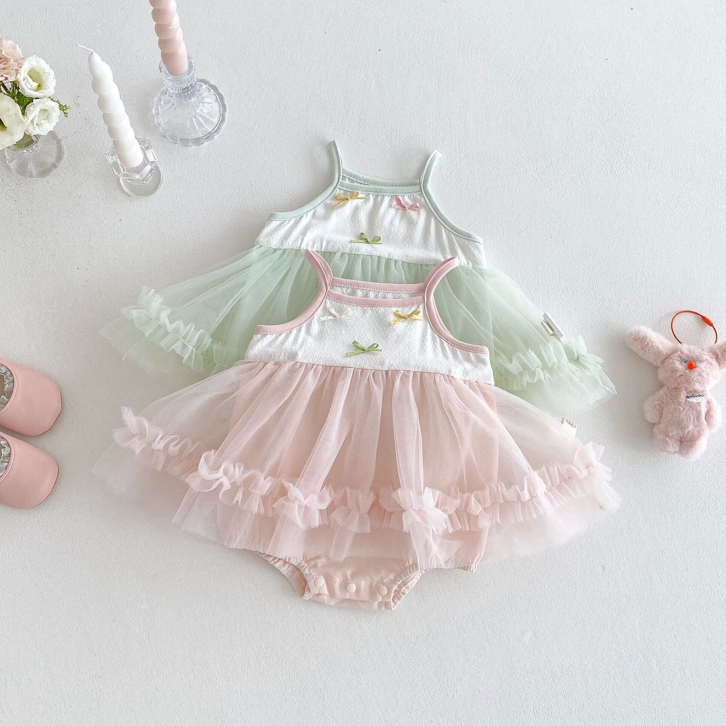 Bow knot ruffle net premium romper