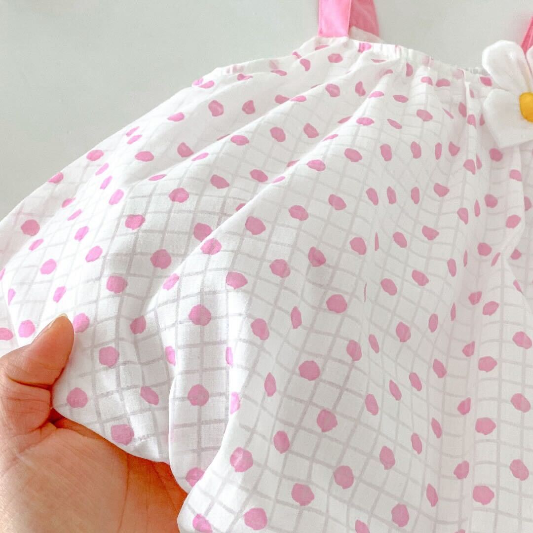 Polka dot pink and white romper