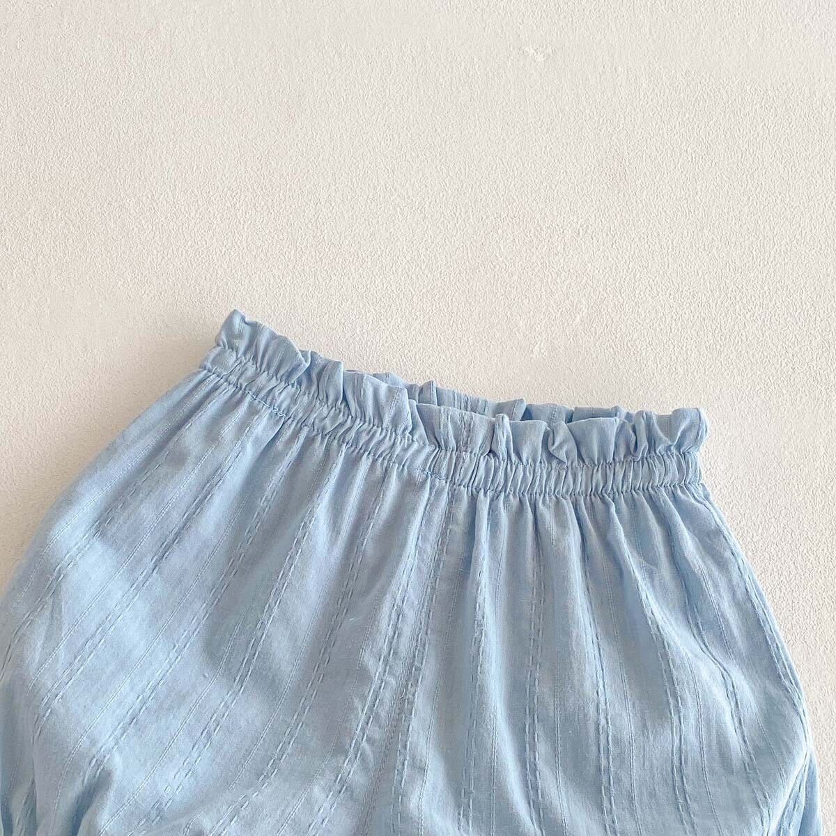 Checkered top and solid shorts set