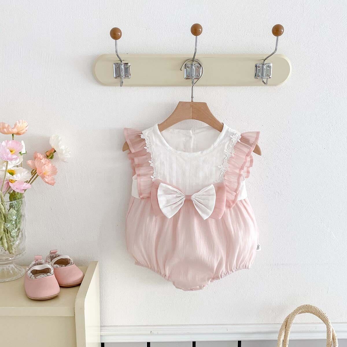 Bow made pink romper