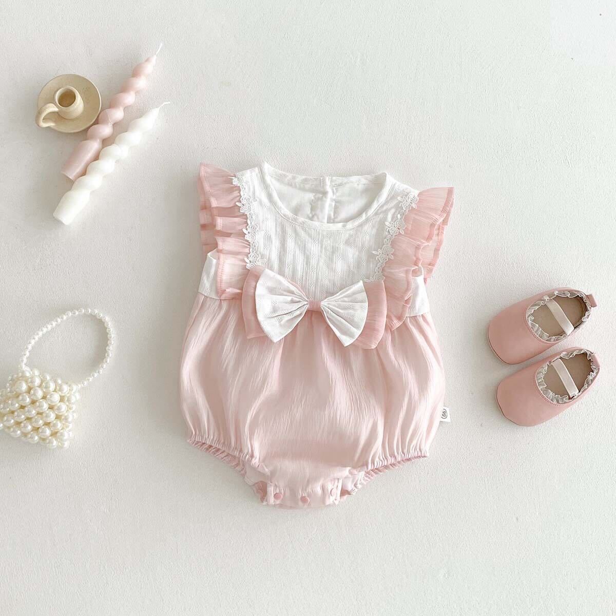 Bow made pink romper