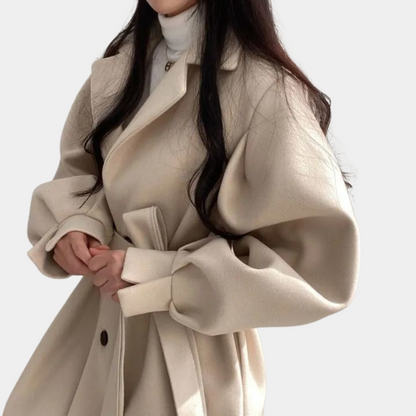 Chic women's coat with trendy puff sleeves and stylish belt
