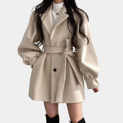 Chic women's coat with trendy puff sleeves and stylish belt