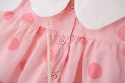 Polka dot buttoned dress with sling