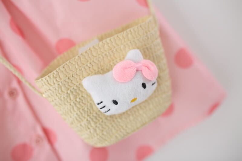 Polka dot buttoned dress with sling