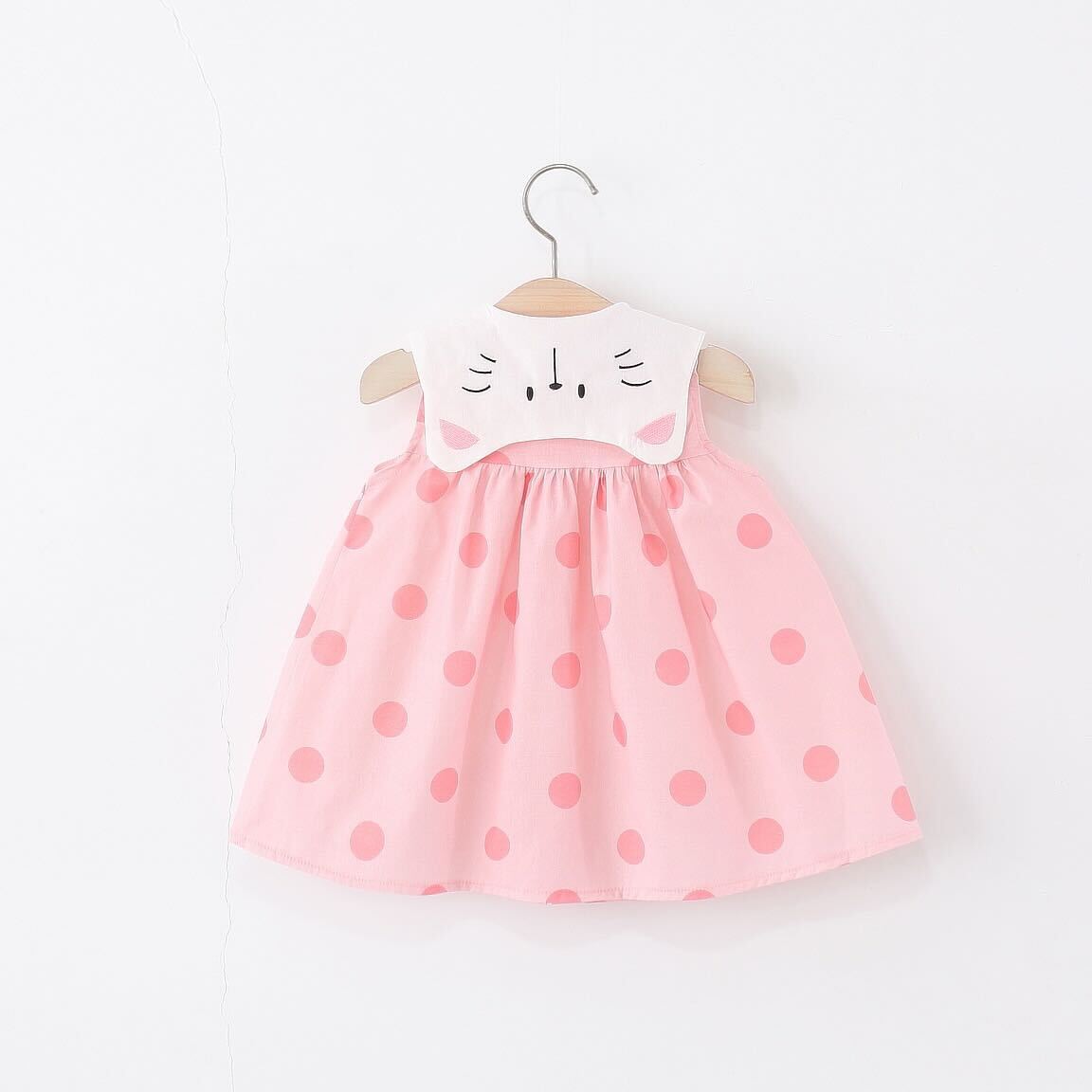 Polka dot buttoned dress with sling