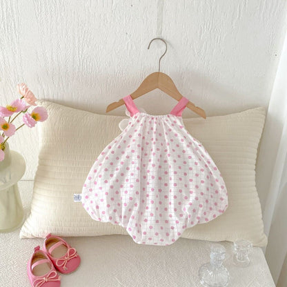 Polka dot pink and white romper